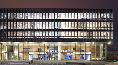 Sciences Po - Le Havre View at night of the library at the Sciences Po Le Havre campus lit from the interior