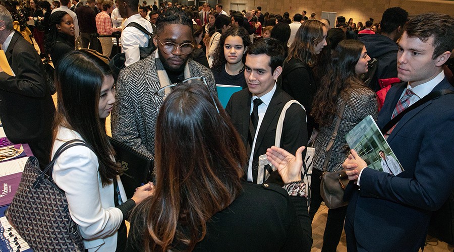 Students speak with a representative at the 2020 Medical School Fair