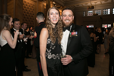 Two attendees pose for the camera during the reception