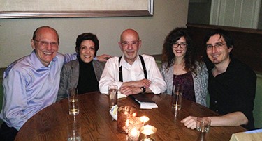 (Left to Right) Dr. James C. Mabry '81GS, Judith J. Mabry, Dean Emeritus Peter J. Awn, Katherine Cartusciello '16GS, and Robbie LeDesma ‘14GS catch up at dinner in NYC in 2016.