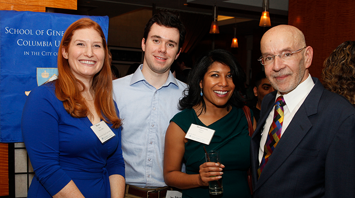 Dean Peter J. Awn and alumni at the Mid-Winter Mixer