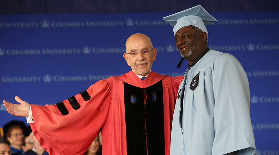 Dean Peter J. Awn and David Norman onstage at the GS Class Day ceremony