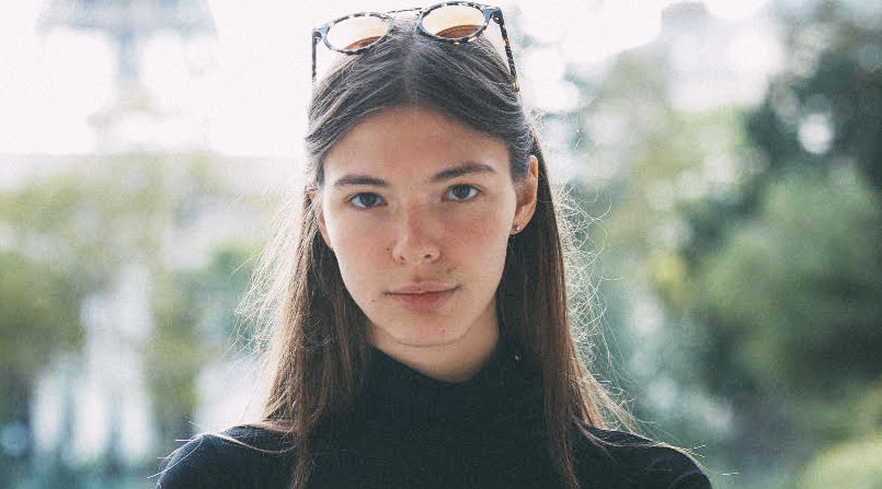 Headshot of Dorothee Grant with sunglasses on her head