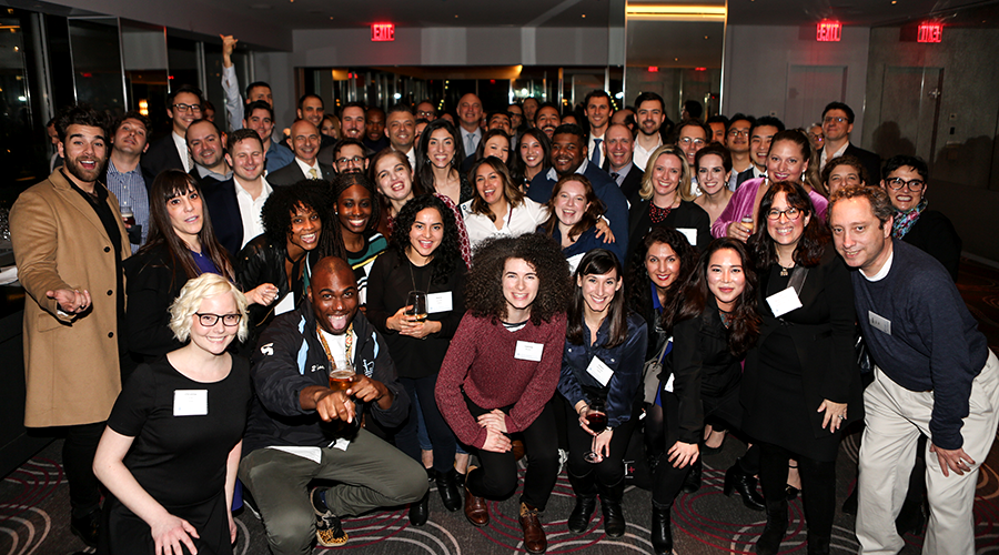 Group shot of alumni attendees at the annual GS Mid-Winter Mixer