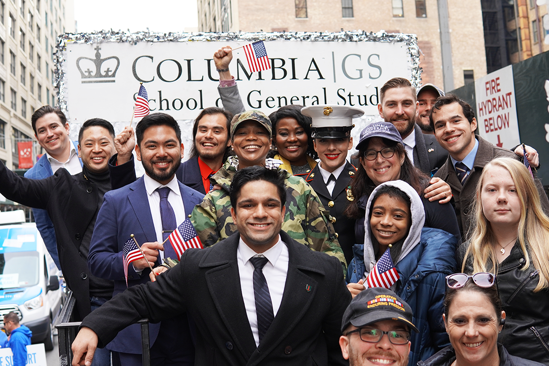 Dean Rosen-Metsch and students, alumni, and guests, on the GS float in the NYC Veterans Day Parade
