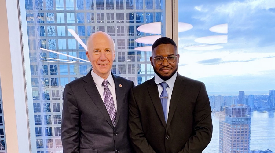 Sylvester Benson (right)  '23GS with Mark Angelson (left), Chair of the Institute of International Education.